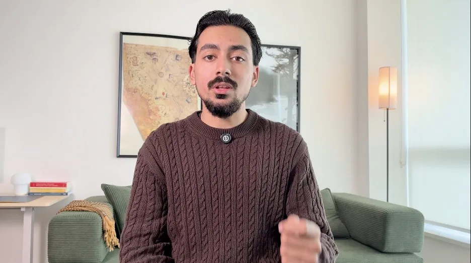 Siraaj Shah speaking to camera in his home studio